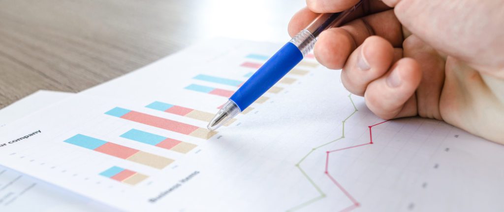 In in this image, someone is pointing to a graph with a ballpoint pen, but studying primary and tertiary markets should not be limited to charts and graphs alone.